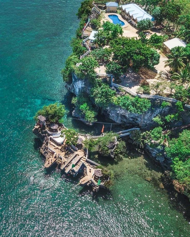 Aerial view of Camotes Island's coastal cliffs, Cebu — a dramatic natural landmark on a CILYC private sailing expedition