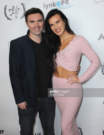 Timothy Woodward Jr. and Natalie Burn attend the "Kash Hovey & Friends" Film Festival held at Regal LA Live on November 06, 2021 in Los Angeles, California.