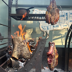 Fire kitchen cooking of tomahawk steak