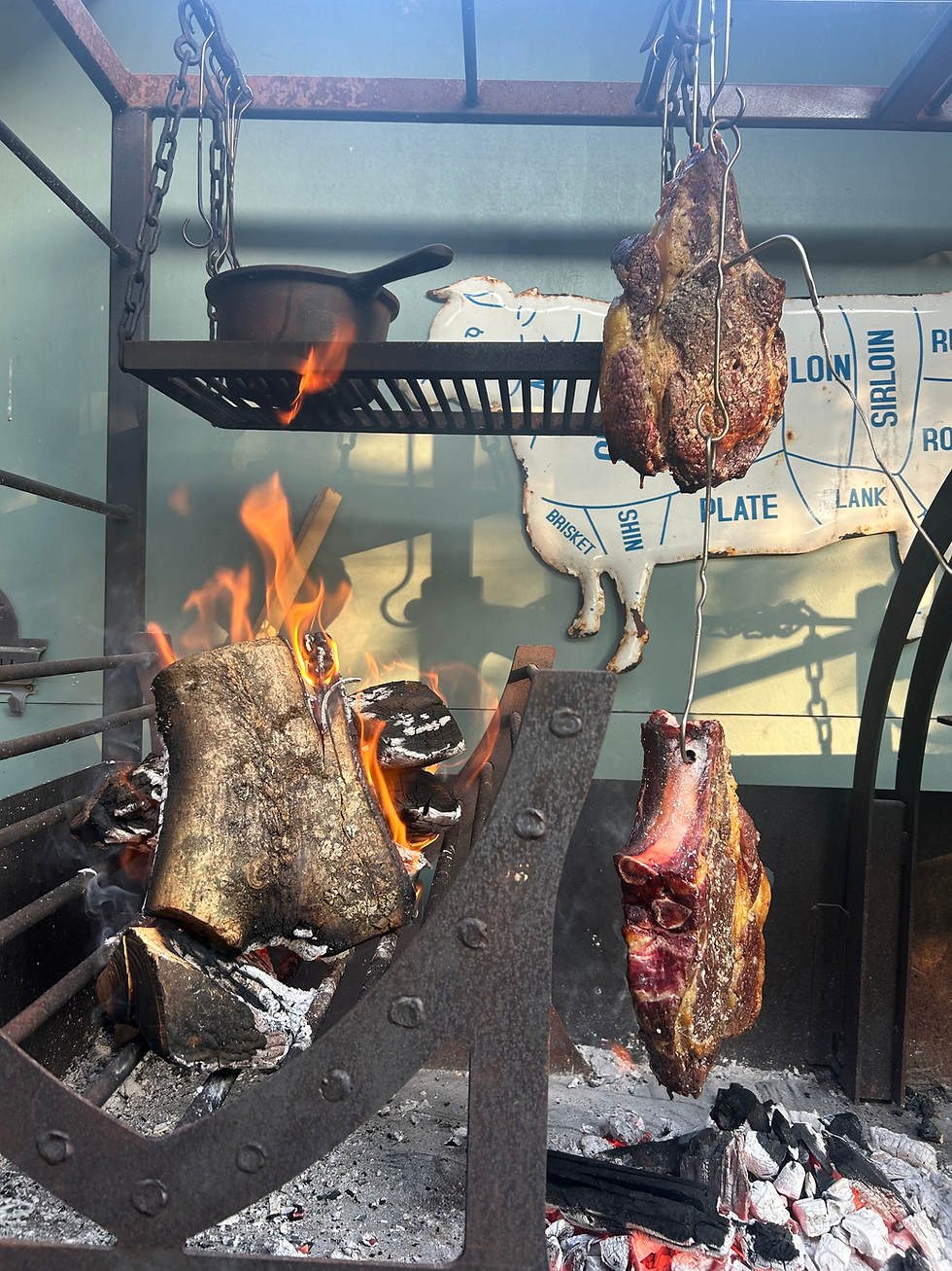 Woody's Shack Fire Kitchen indirect cooking of tomahawk steaks