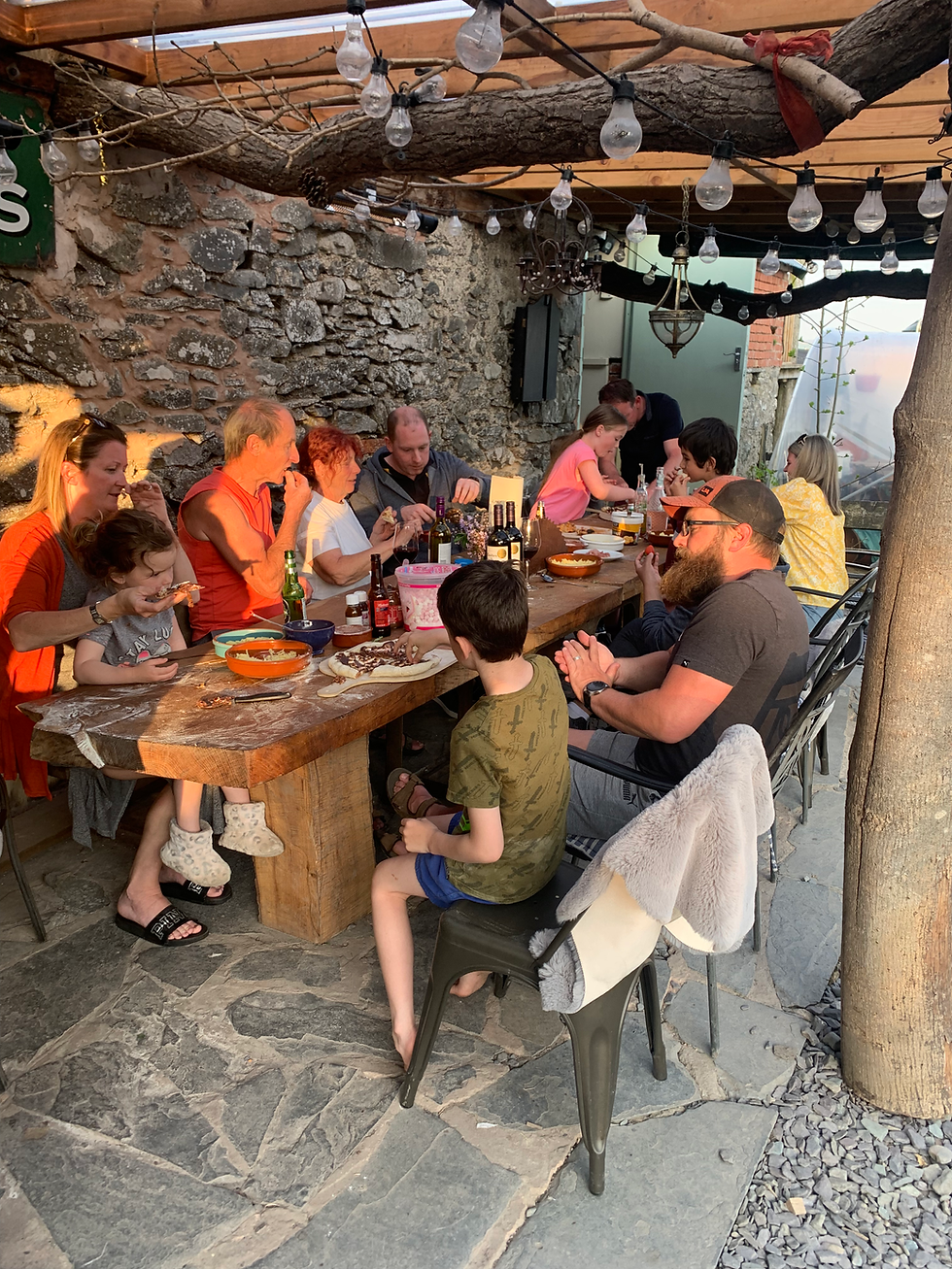 Pizza Making Experience around long log table