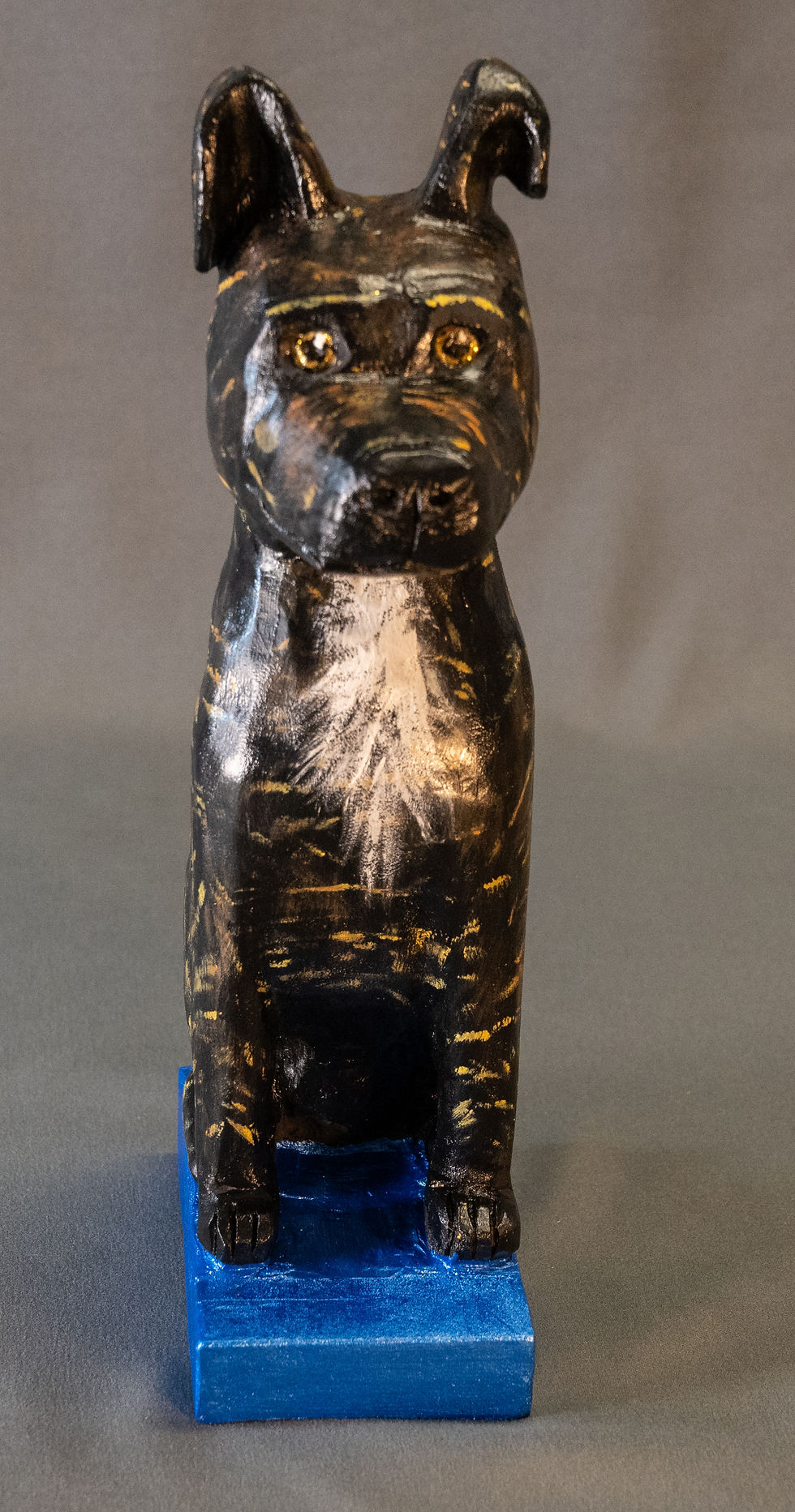 Richard Paiva - brown dog on blue base