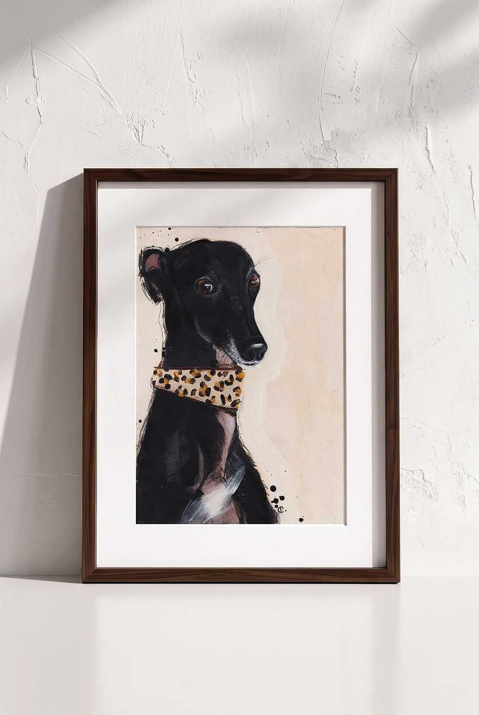 The Magic Word black whippet portrait displayed with a white mount in a dark wooden frame