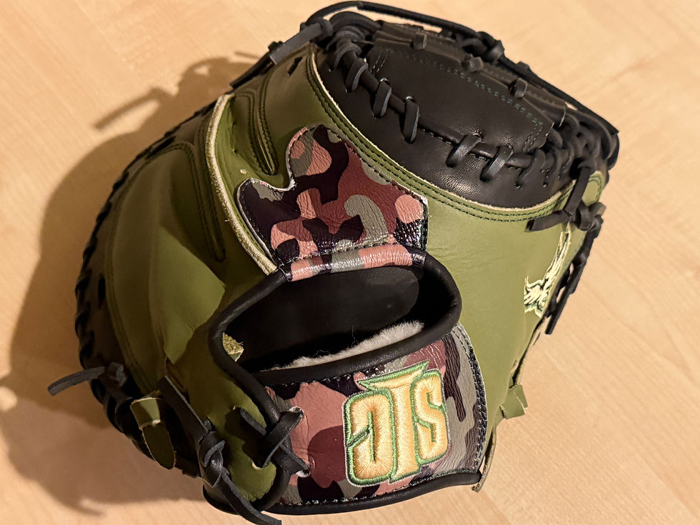 Eye-level view of a custom youth catcher's mitt with personalized colors and design