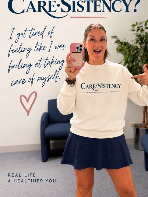 Michelle wearing a Care•sistency sweatshirt and smiling, representing her journey toward taking care of herself with less pressure and more grace.