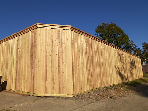New board on board fence with top trim board