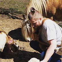 Jay Jay Surrounded by Animals.jpg