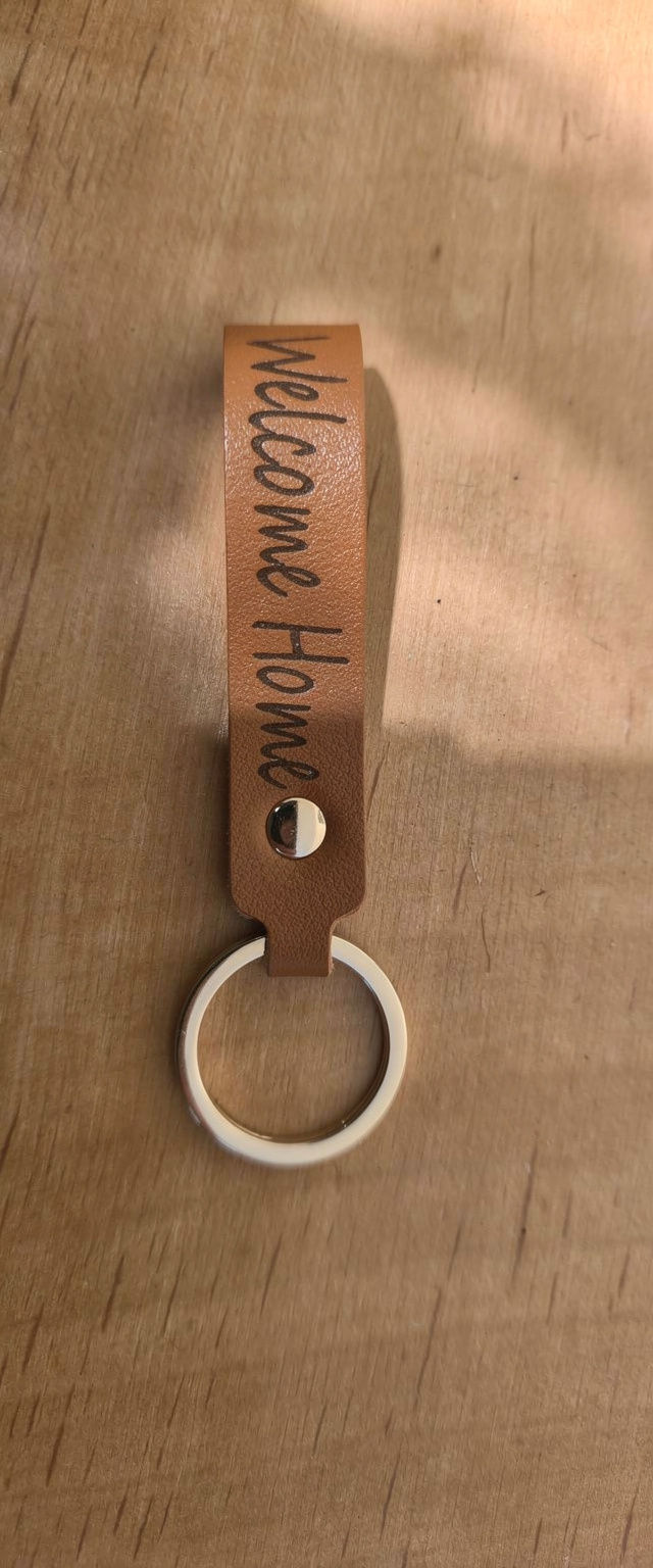 Thumbnail: Leather keychain with Welcome Home engraved text