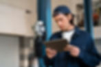 male-car-mechanic-using-tablet-device-car-repair-shop.jpg