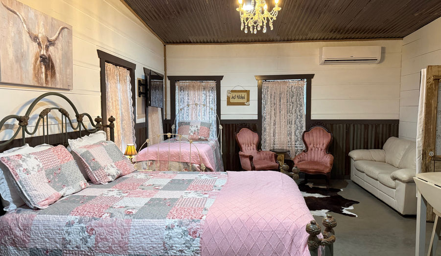 The bridal suite cabin is available for weekend weddings only!  This cabin includes a queen bed, lounge area, coffee bar and more!