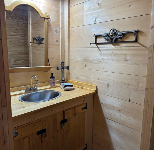 Enjoy a vanity with a hair dryer, towels, soap, shampoo and necessaries.