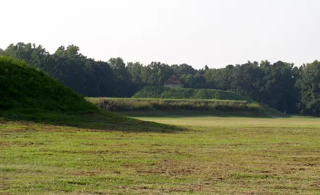 Image credit: A view across the plaza from Mound J to Mound B, with Mound A prominently featured in the center. Courtesy of University of Alabama Museums.