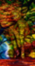 Picture of a woman with body paint on merging with trees