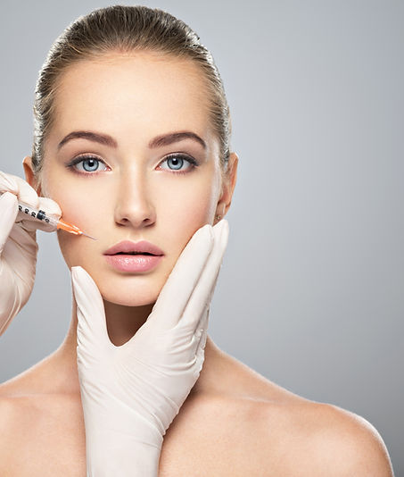 Woman getting cosmetic injection of botox near lips, closeup. Woman in beauty salon. plast