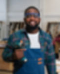 afro-american-craftsman-working-as-carpenter-in-a-2024-11-29-19-56-27-utc_edited.jpg
