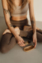 kaboompics_young-adult-woman-yoga-mat-leggings-exercise-outfit-sage-28680.jpg
