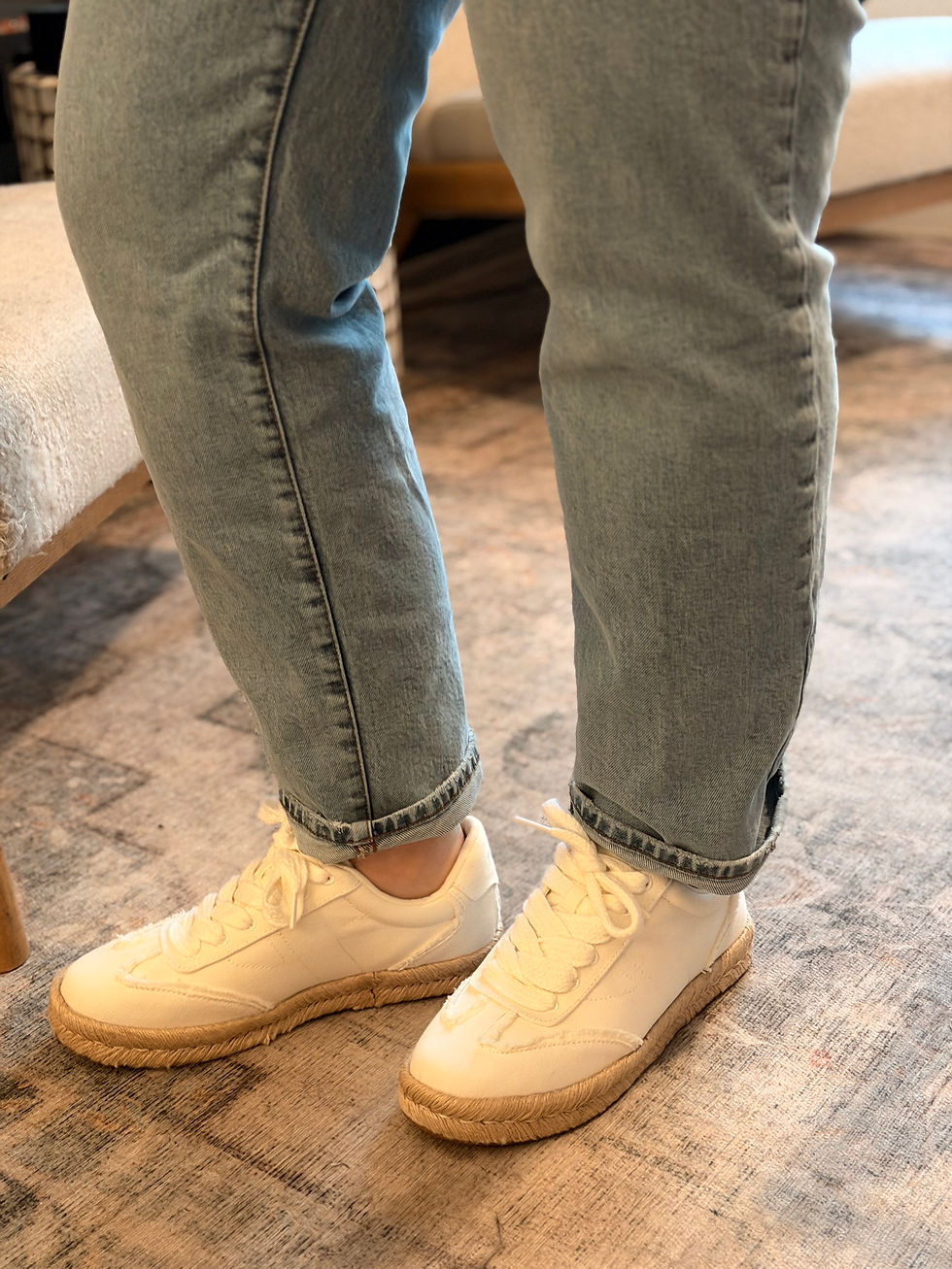 Close-up of TOMS Jesse Espadrille sneakers worn with cuffed denim for an everyday spring outfit