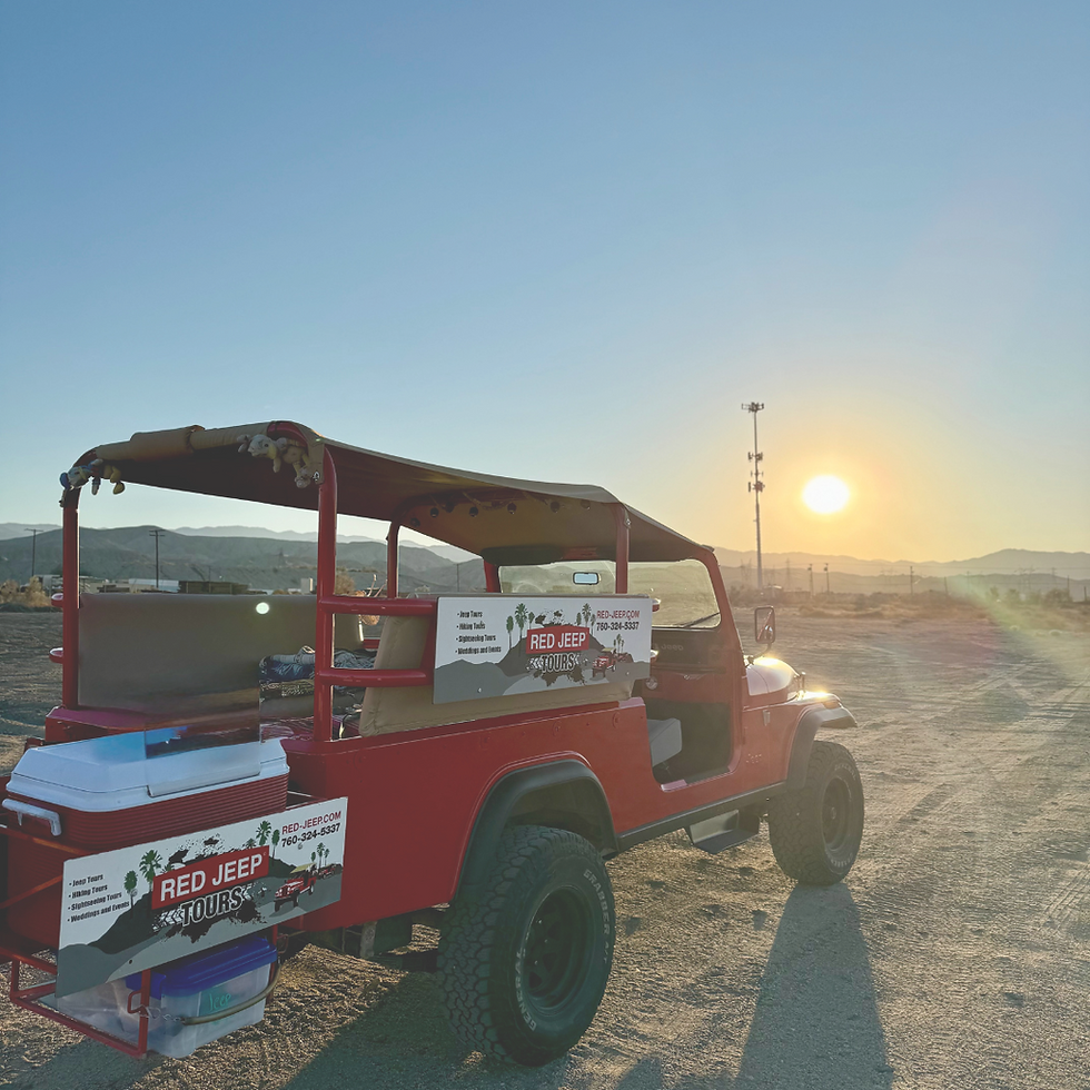 The Red Jeep with the sun rising behind it at the Red Jeep Tours
