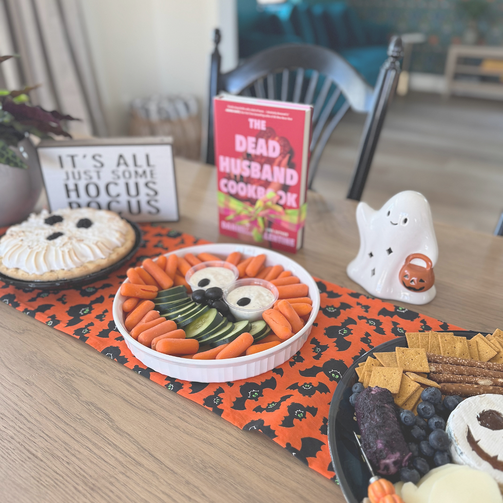 The dining room table filled with all kinds of Summerween treats