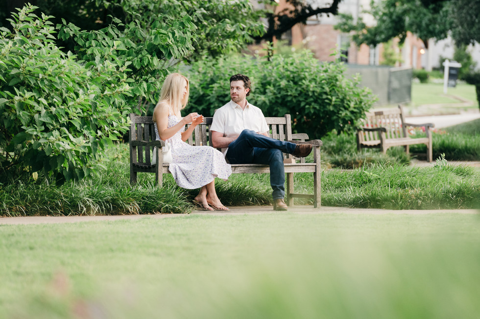 Woman reading cue cards during a Dallas proposal at Flippen Park.