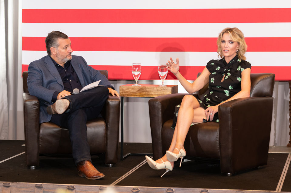 Ted Cruz and Megyn Kelly speaking on stage during private political event in Deer Valley, Utah.