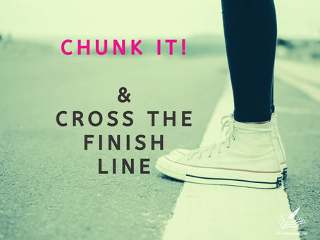 pair of feet standing on the finish line -  CHUNK IT! and cross the finish line