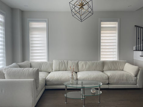 Thornhill Woods interior restoration by StrongRise Builders featuring a precision-leveled open-concept living zone with structural subfloor integration and seamless architectural wall finishing.