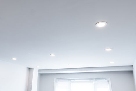Professional recessed pot light installation on a clean white ceiling in a Thornhill home renovation project.
