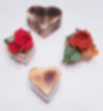 Heart ring boxes decorated with flowers to match your theme