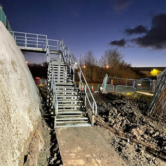 The original staircase and gantry were reinstated, saving DHL the cost of a replacement and better for the environment.