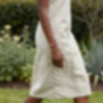 Woman wearing a minimalist gold bangle