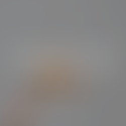 A hand holding 3 bottles of skincare products with a white background. Text that reads: Update your skincare routine in perimenopause: 4 tips from a naturopathic doctor. Written By: Dr. Tamarah Chaddah, ND