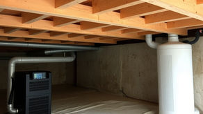 Florida crawl space with humidity damage showing moisture on pipes and wood