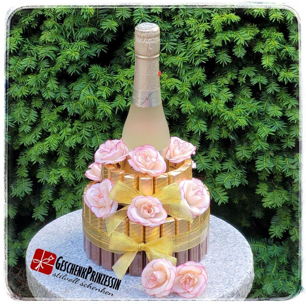 2-stöckige Merci Torte mit Sekt