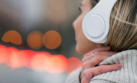 close-up-woman-roof-holding-heaphones-head-form (1).jpg