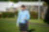 Personal trainer holding a beeper.