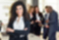 businesswoman-leader-in-modern-office-with-businesspeople-workin.jpg