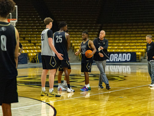 Barrington Hargress gathers at center court during the Buffaloes' first practice of the 2025 season