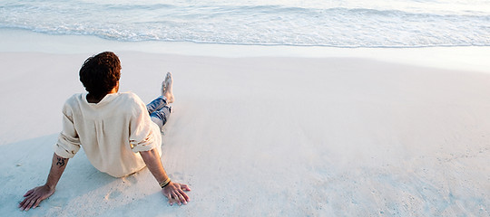 Gazing Out to Sea | Man feeling supported after working with one of the best trauma therapists in Coral Springs Florida