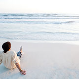 Man relaxing at the beach near studion on marine in Kingscliff NSW