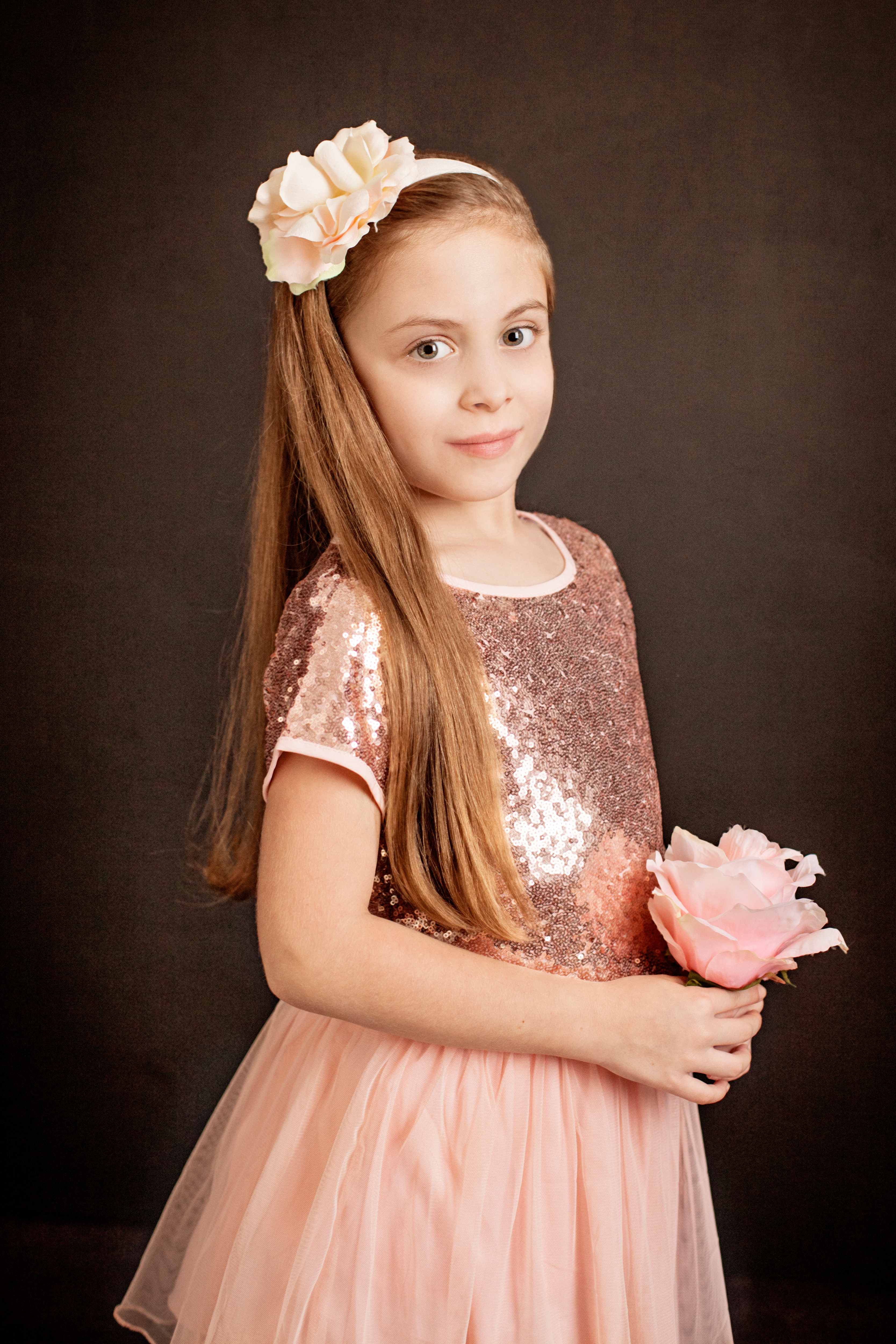 girl with pink flower