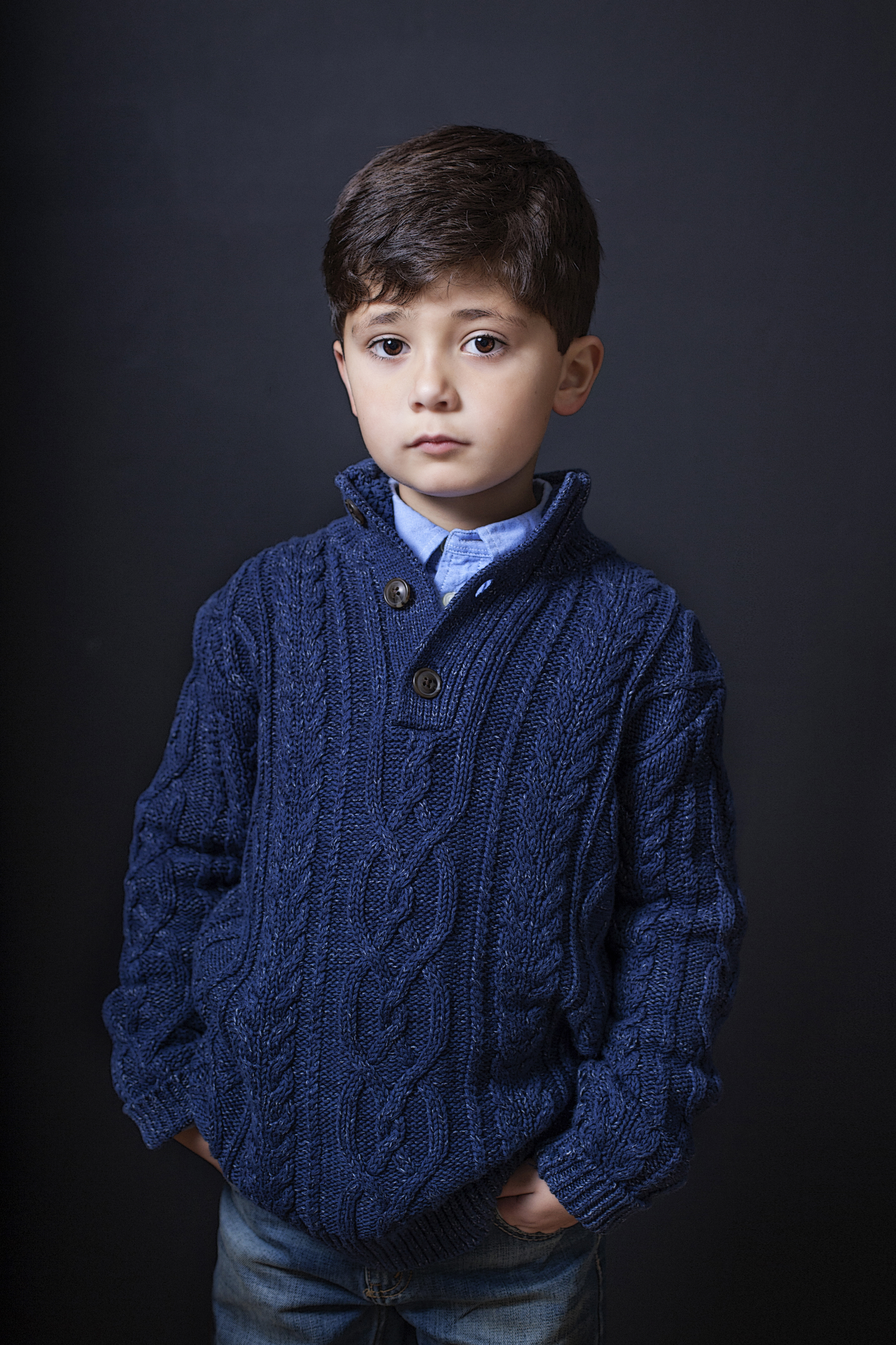 boy with blue sweater