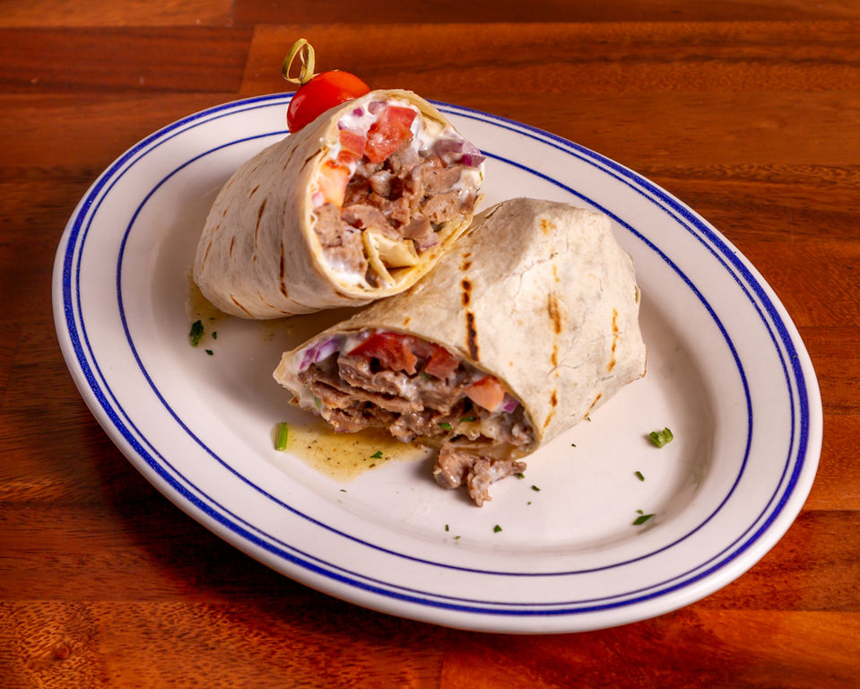 Gyro Wrap
Gyro meat, onions, tomatoes, tzatziki sauce and french fries, all wrapped in a chargrilled tortilla