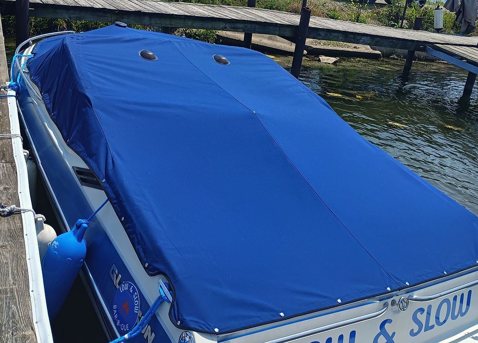 Eye-level view of a custom boat cover fitted snugly to a boat