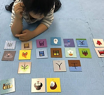 children playing with flashcards