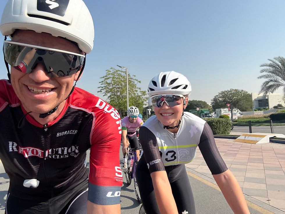High angle view of cyclists taking a break with water bottles and snacks at Meydan cycle track