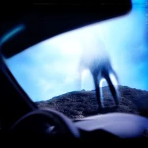 Vessel by Nine Inch Nails Album Cover with hand coming down from the sky