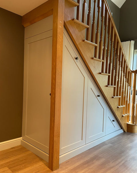 Understairs storage for shoes and coats
