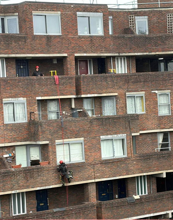 Window repairs on a residential block