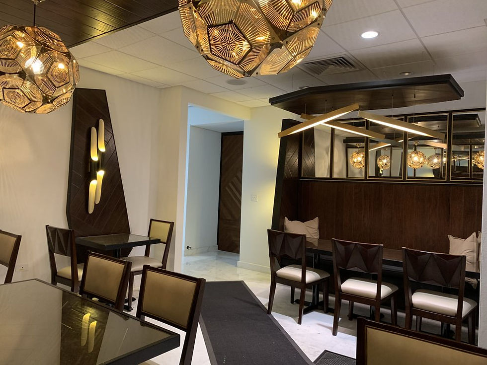 dining room with large spherical lights hanging down from the ceiling